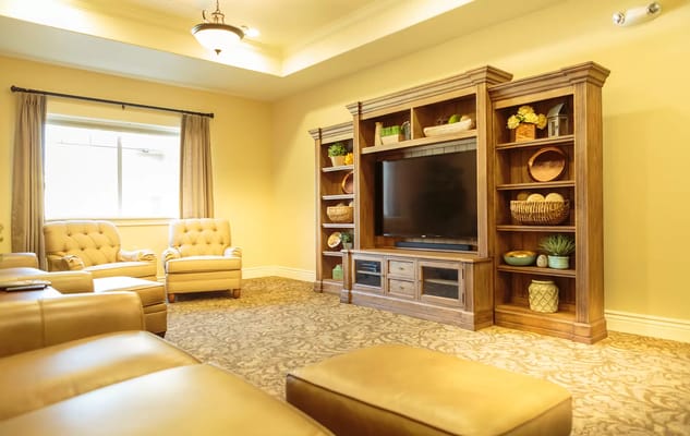 Comfortable lounge area with seating and shelves