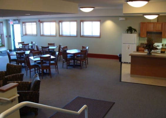 Common dining area with tables and chairs