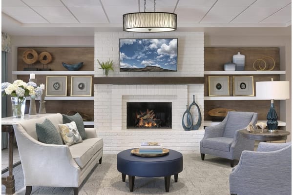 Cozy lounge area with modern decor and fireplace