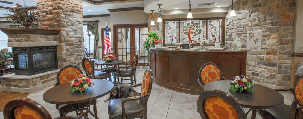 Common area with seating and decorative flowers