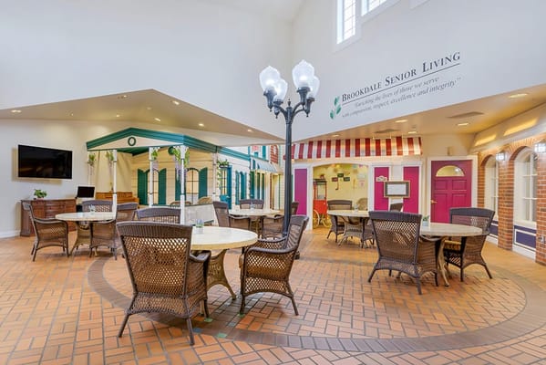 Bright interior common area with tables and chairs