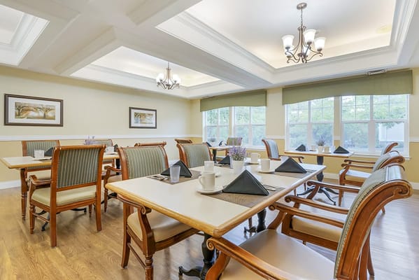 Well-furnished dining area with tables and chairs
