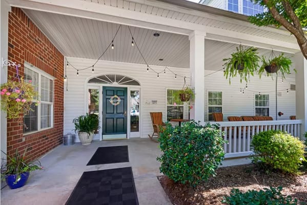 Entrance of the Brookdale Ebenezer Road facility with seating.
