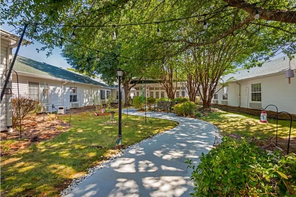 Pathway through a well-maintained garden area