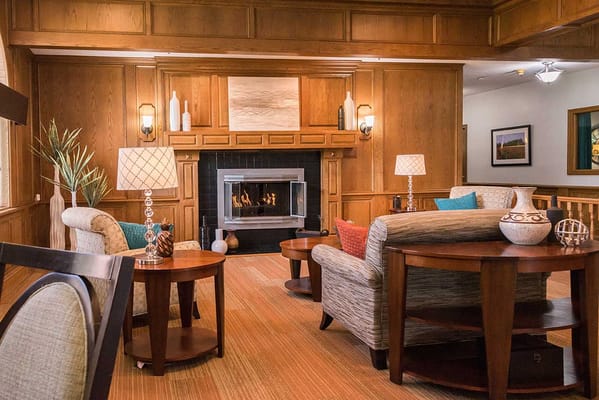 Cozy common area with seating and a fireplace