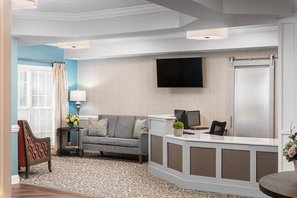 Interior reception area with seating and desk