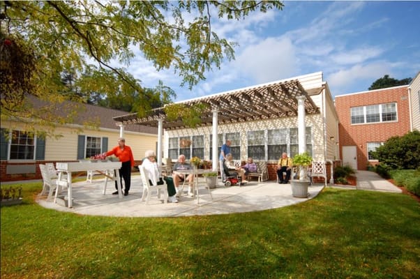 Residents socializing in a garden area
