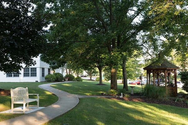 Pathway leading to a gazebo in the garden