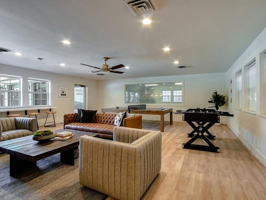 Bright and spacious common area with games and seating