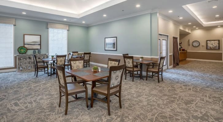 Interior view of a common area with dining tables