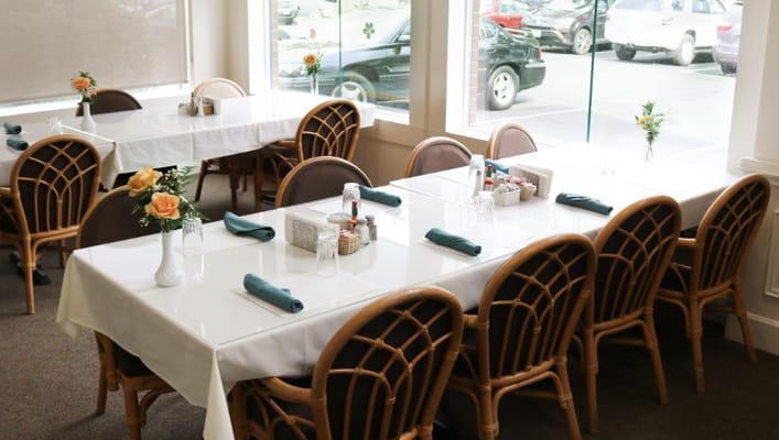 Bright dining area with neatly arranged tables
