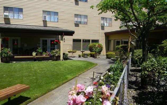 Outdoor garden area with seating and landscaping