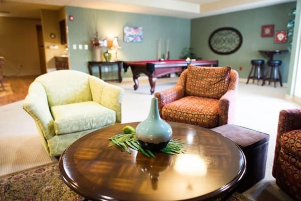 Cozy common area with comfortable seating and pool table