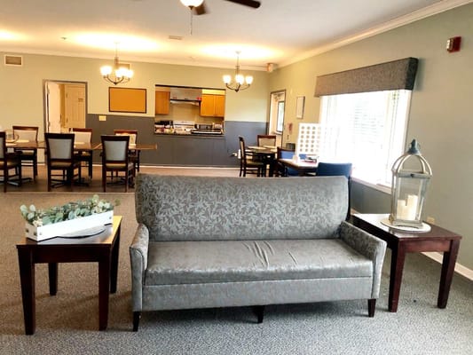 Cozy common area with couches and dining space