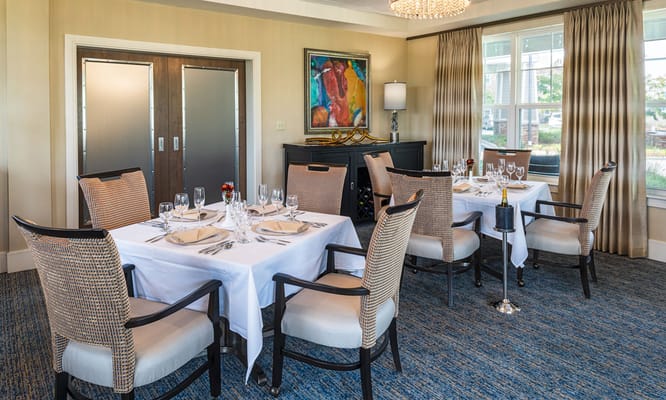 Elegant dining room setup with multiple tables