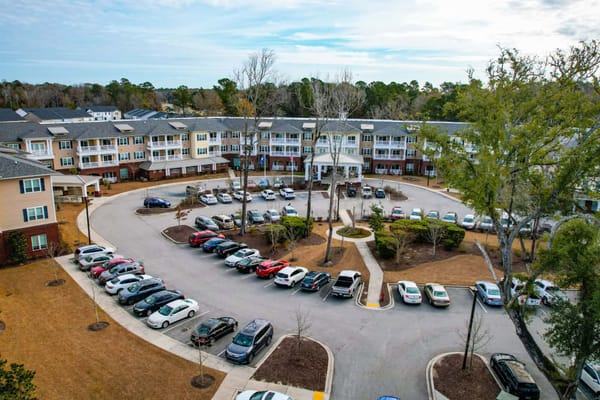 Aerial view of the assisted living facility with parking area