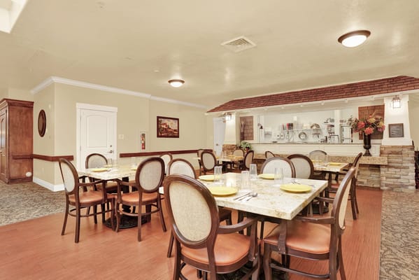 Dining area with tables set for meals