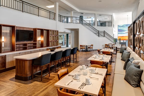 Dining area with tables set for a meal