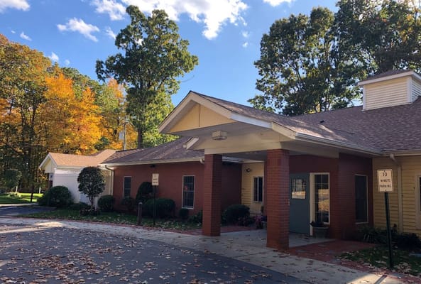 Exterior view of Hope Alzheimer's Center with fall foliage