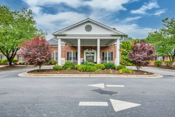 Front view of Kerner Ridge senior living facility with landscaped entrance