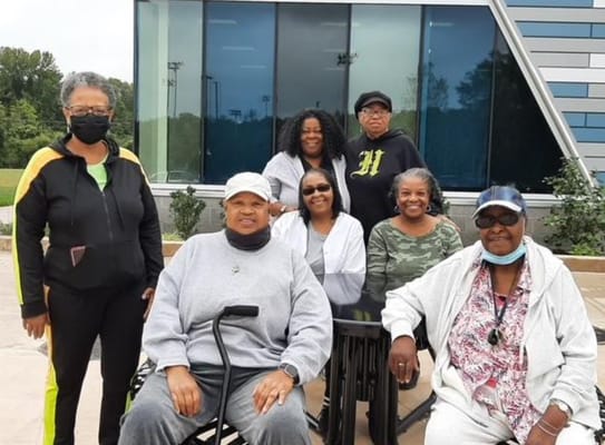Residents enjoying time outdoors in a group setting