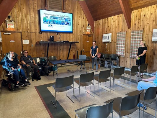 Residents and staff during a training session in a common area