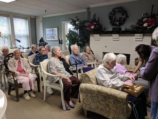 Residents engaged in a group activity in the common area
