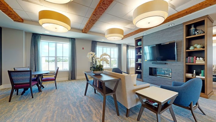 Common area with seating and natural light