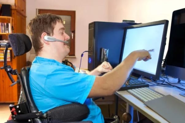 Individual using a computer in an indoor setting