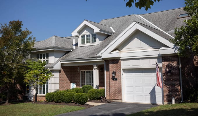 Exterior view of a brick building with landscaping