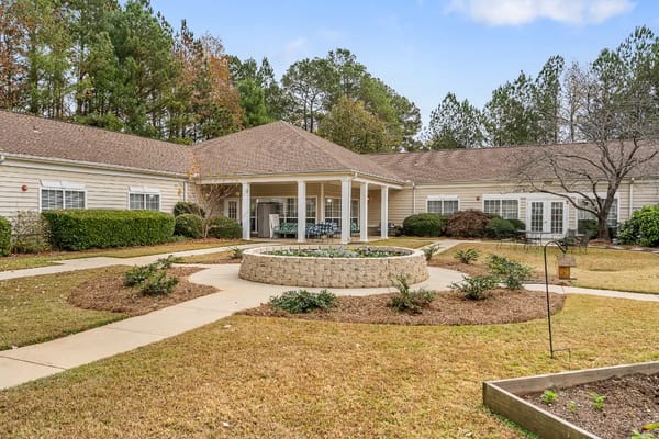 Outdoor courtyard with seating and landscaping