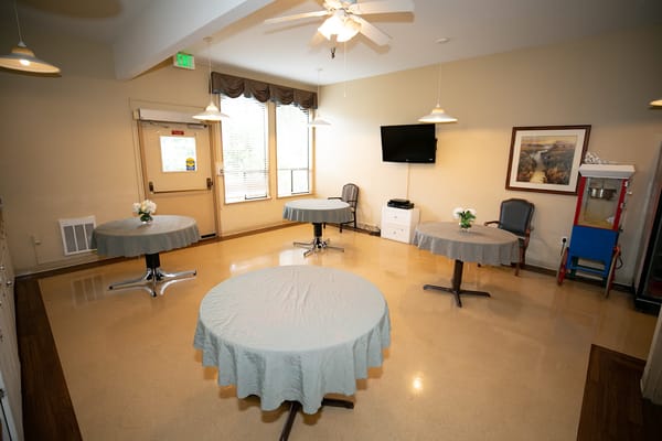 Interior common area with tables and chairs