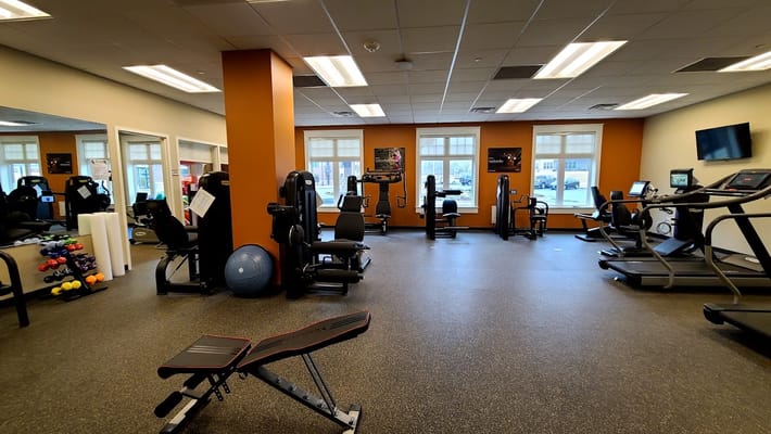Interior view of a fitness room with exercise equipment