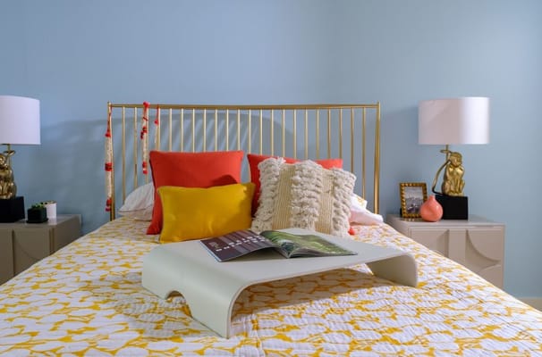 Cozy bedroom with colorful decor and cushions