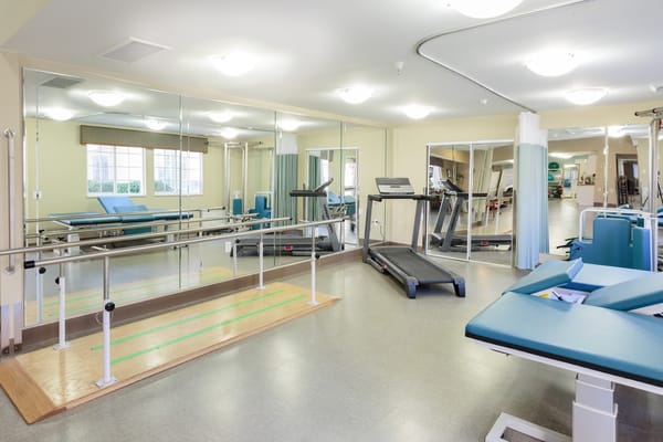 Interior view of a rehabilitation area with equipment