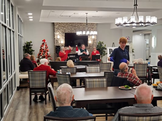 Residents enjoying a festive event in the common area