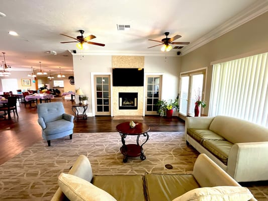 Cozy common area with seating and a fireplace
