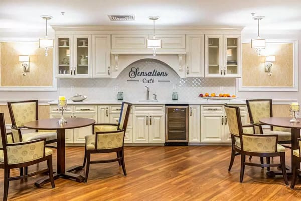 Bright dining area with tables and chairs