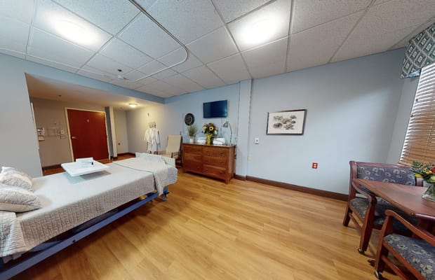 Bright and spacious resident room with furnishings