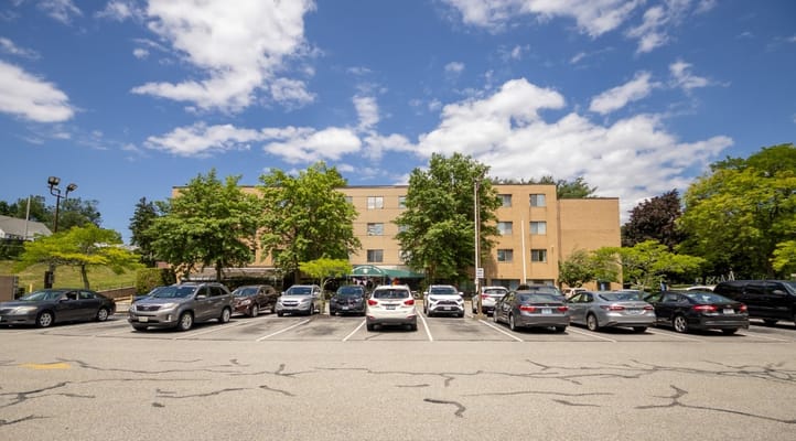 Exterior view of the facility with parking area