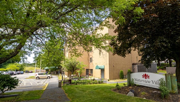 Exterior view of Waterview Villa with landscaping