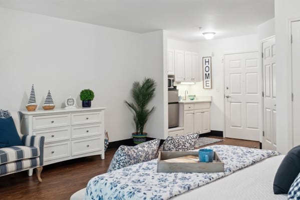 Bright interior of a resident room with modern furnishings