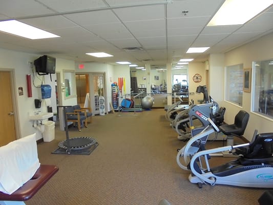 Interior view of a fitness area with exercise equipment