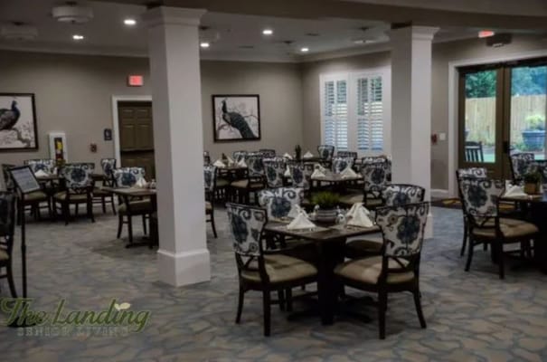 Well-arranged dining area with tables set for meals