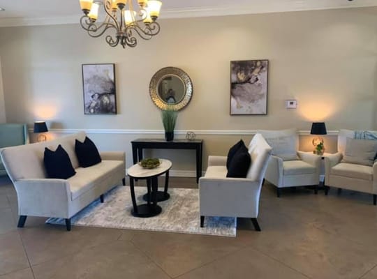 Cozy common area with seating and decorative lighting