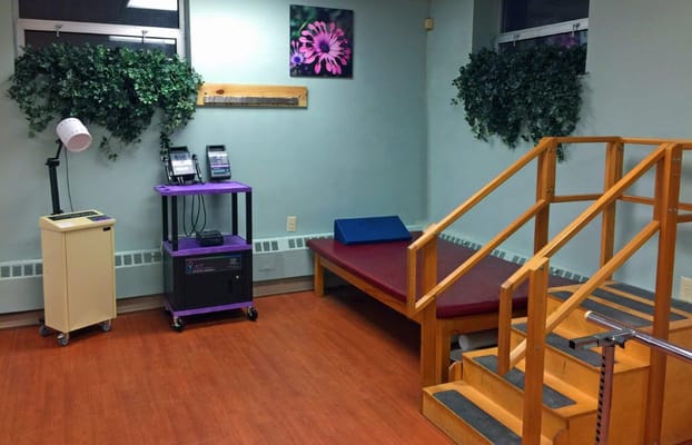 Interior view of a rehabilitation room with equipment