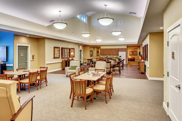 Interior view of a common area with seating and tables