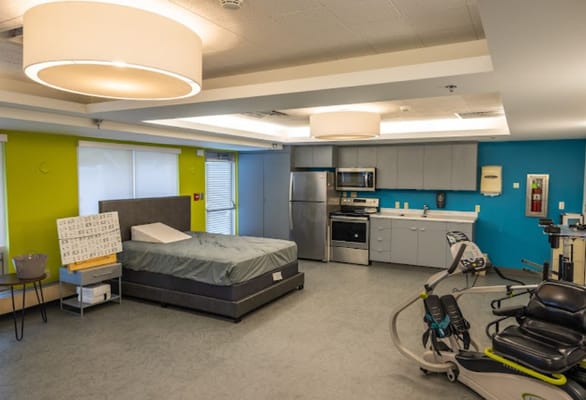 Well-equipped rehabilitation room with medical equipment