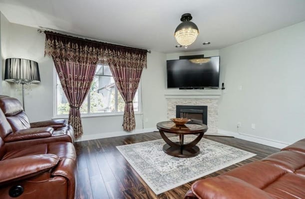 Cozy common area with seating and a television