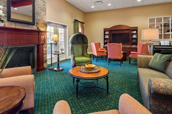 Comfortable living room with seating and fireplace